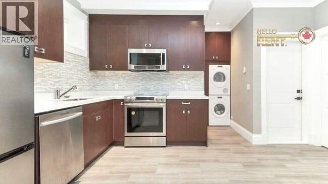 Building Photo - BASEMENT SUITE-4217 W 16TH AVENUE
