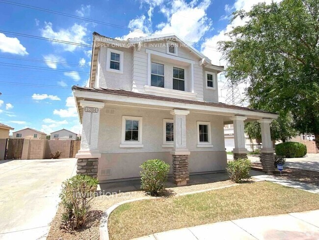 Building Photo - 1204 S 120th Ln