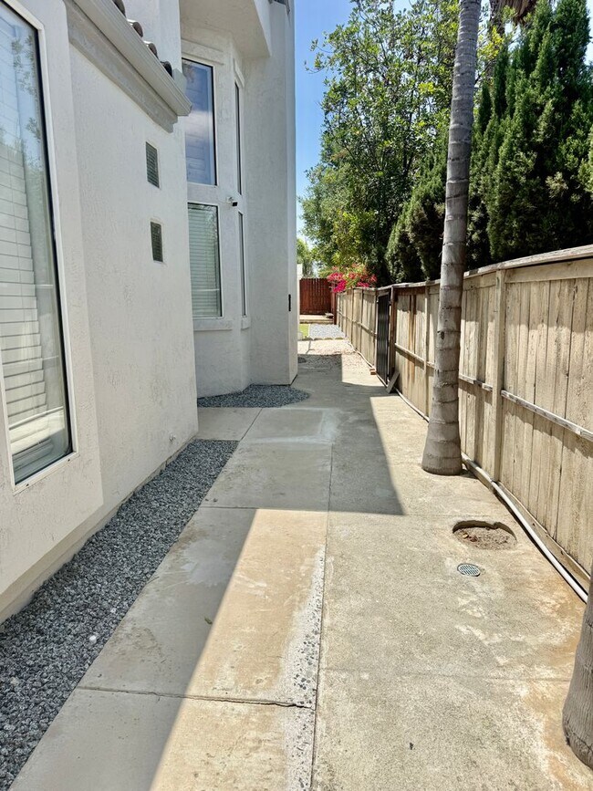 Building Photo - Spacious 4 Bedroom, 3 Bath Home with 3-Car Garage & Landscaping Included