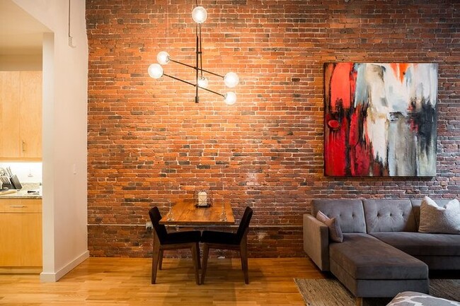 Building Photo - Professionally designed modern 1BR brick &...