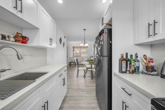 Building Photo - 6550 Royal Palm Blvd