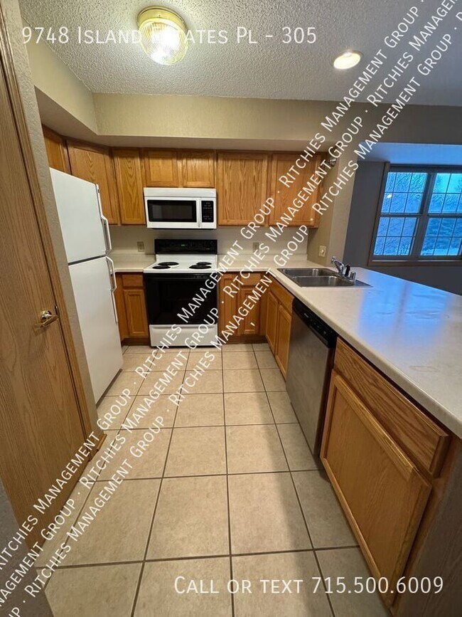 Building Photo - 9748 Island Estates Pl