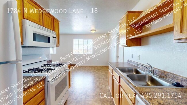 Foto del edificio - 2 Bedroom Wedgewood Apartment