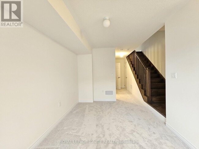 Building Photo - 919 Crowsnest Holw