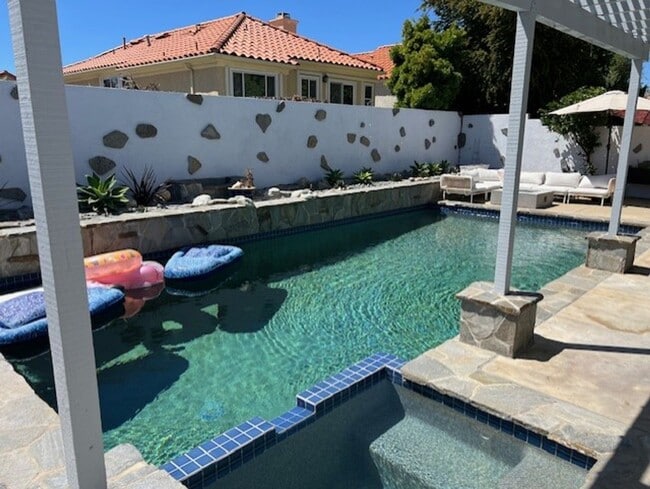 Building Photo - Coastal Elegance Meets Family Comfort in D...