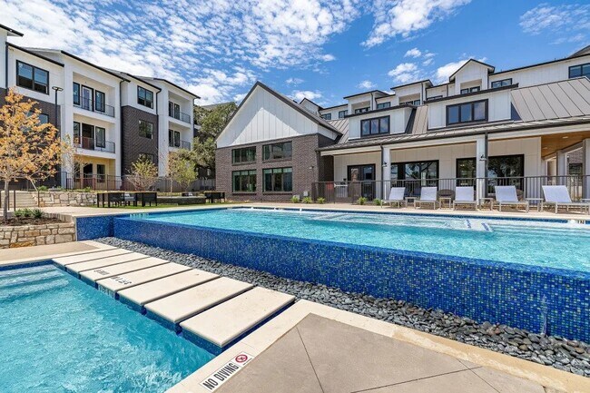 Building Photo - Opulent Escapes: Luxury Apartments for the...