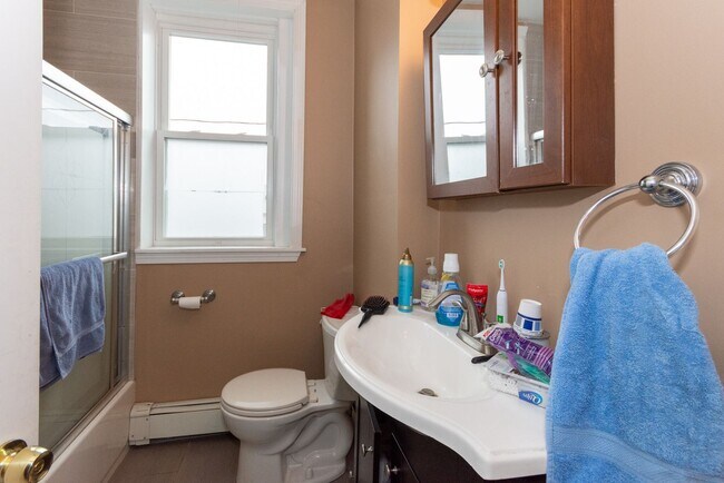 Building Photo - Large 5 bedroom, 2 full baths, right on the T!