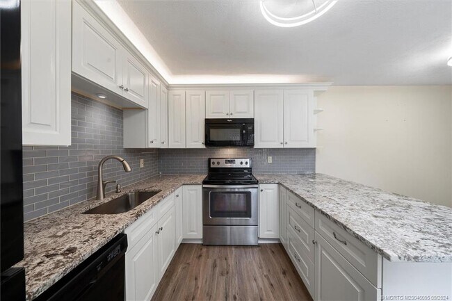 Foto del edificio - 6522 SE Windsong Ln