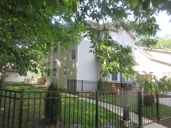 fenced, shaded yard - 307 W Columbia Ave