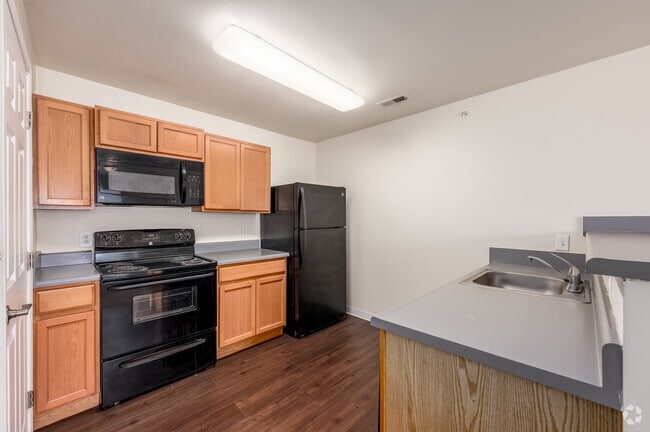 2 habitaciones, 2 baños - 715 pies cuadrados - Cocina - The Annex of Kokomo