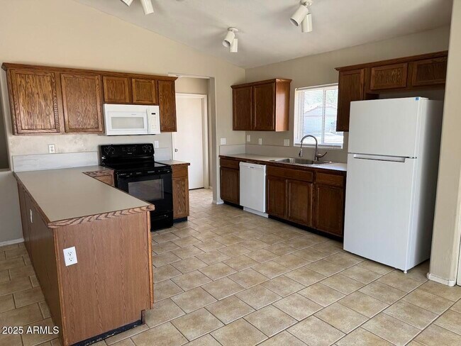 Building Photo - 12502 W Charter Oak Rd