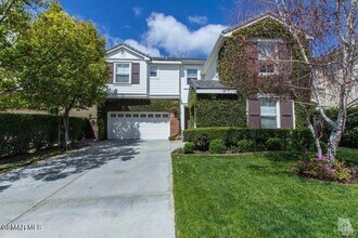 Building Photo - 6077 Mandeville Pl