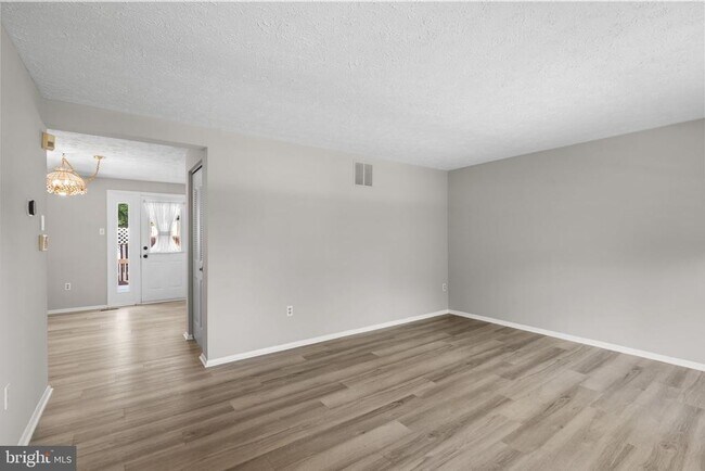 Building Photo - 7807 Breezy Down Terrace