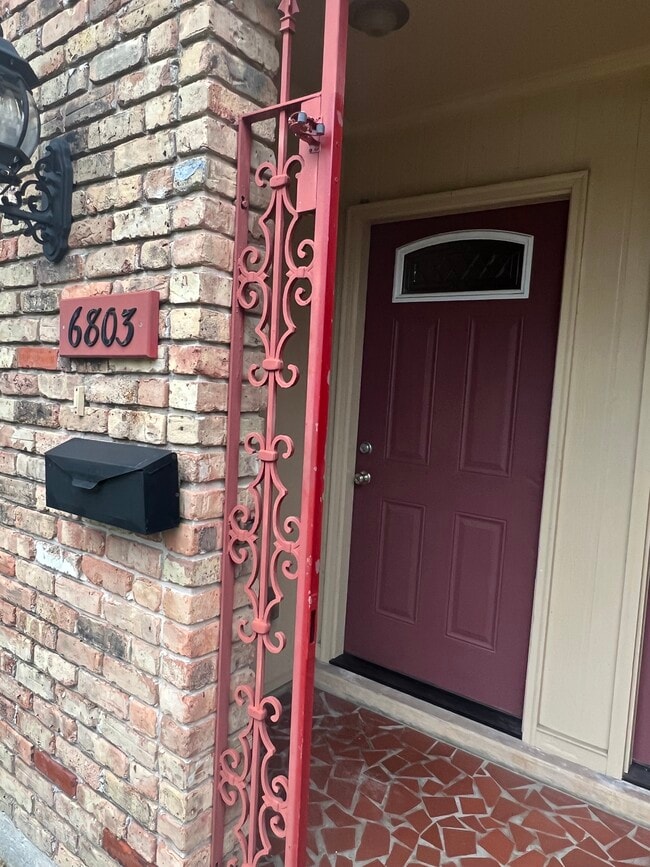 Front door: left side of duplex - 6803 Louisville St