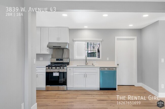 Building Photo - Spacious & Renovated Single Family Home | ...