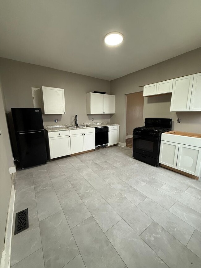 Foto del edificio - 7718-7720 Harrison Ave