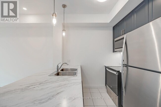 Photo du bâtiment - 450-1450 Dundas St E