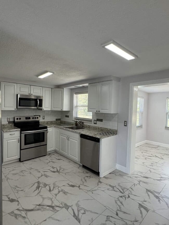 Building Photo - 7052 Navy Dr