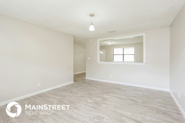 Building Photo - 6775 Rivercrest Dr