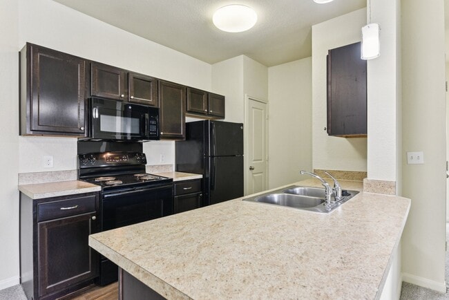 Fully Equipped Kitchen with Breakfast Bar - The Heights on Parmer