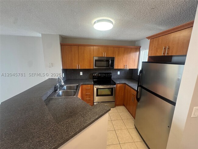Building Photo - 8750 N Sherman Cir
