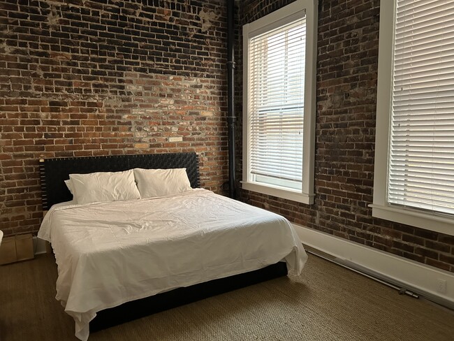 Quiet bedroom in back of unit off of the street. - 20 W Oglethorpe Ave