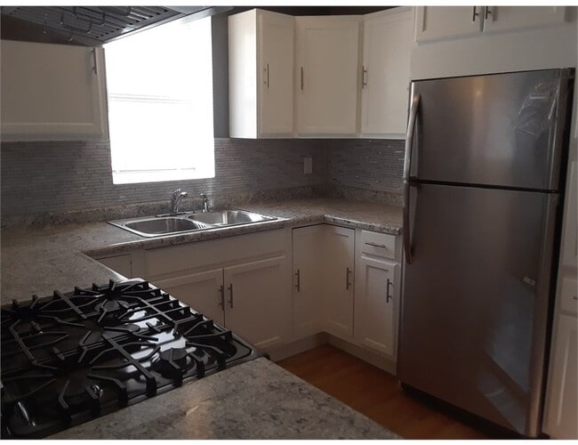 Building Photo - 11122 S Vernon Ave