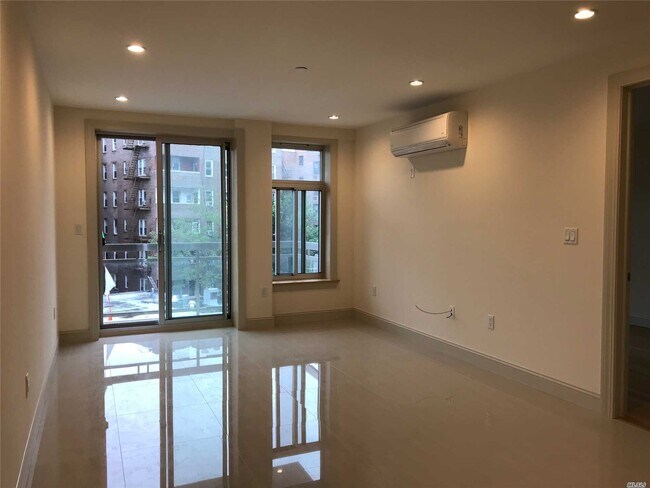 Building Photo - 65-38 Austin St