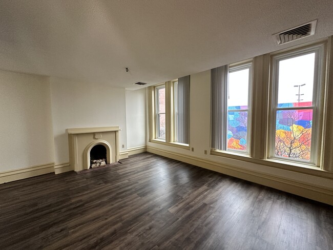 Studio Apt with Faux Fireplace - Opera Block Apartments