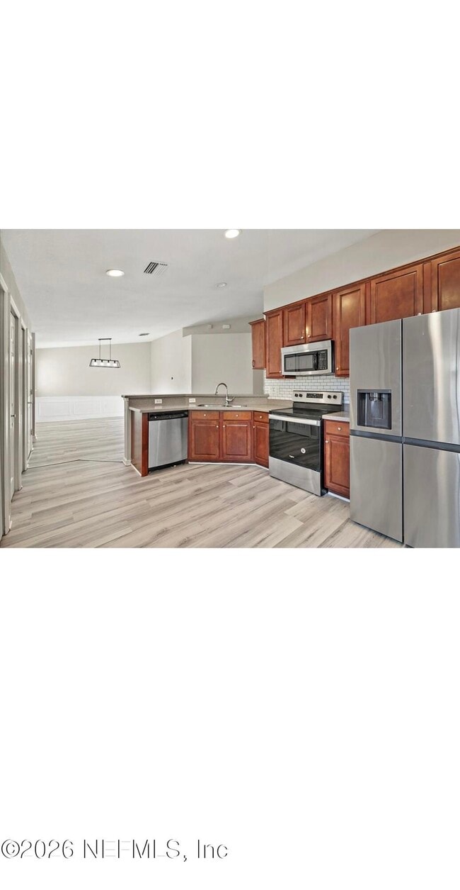 Foto del edificio - 6607 White Blossom Ct