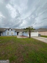 Building Photo - 209 Royal Palms Ave