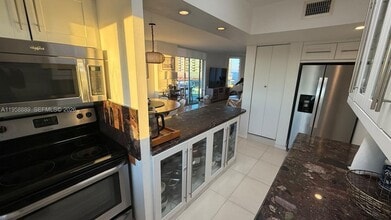 Building Photo - 5900 Collins Ave