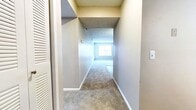 This 830 square foot apartment in Nashville, TN offers a practical and comfortable living space. The single-floor layout includes two bedrooms, two bathrooms, a living room, kitchen, and hallway. The primary bedroom is generously sized at 170 square feet, providing ample space for a restful retreat.

The interior features a neutral color palette with carpeted bedrooms and living areas, creating a cohesive and cozy atmosphere. The bathrooms are updated with modern fixtures, including white cabinetry, granite countertops, and wood-look flooring. One bathroom showcases a bathtub-shower combination, while the other offers a stand-alone shower.

The kitchen, though compact, is efficiently designed with white cabinetry, granite countertops, and black appliances, including a full-sized range. Wood-look flooring in the kitchen adds warmth and durability to the space.

Large windows in the bedrooms and living areas allow for natural light, brightening the interior. The apartment also features practical amenities such as ceiling fans and ample closet space with louvered doors.

This apartment offers a comfortable and low-maintenance living option, ideal for singles, couples, or small families looking for a modern home in a convenient Nashville location.
