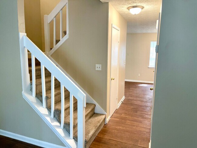 Building Photo - Welcome to this ADORABLE Space, a charming...