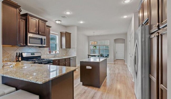 Building Photo - 7824 W Pelican Lakes Ave