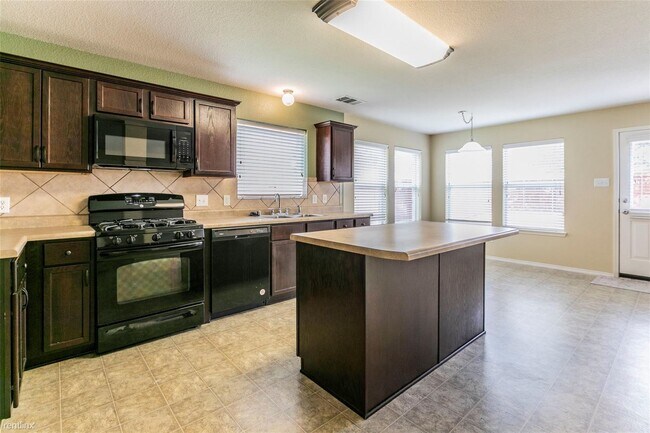 Building Photo - 3 br, 2.5 bath House - 10640 Colfax Dr