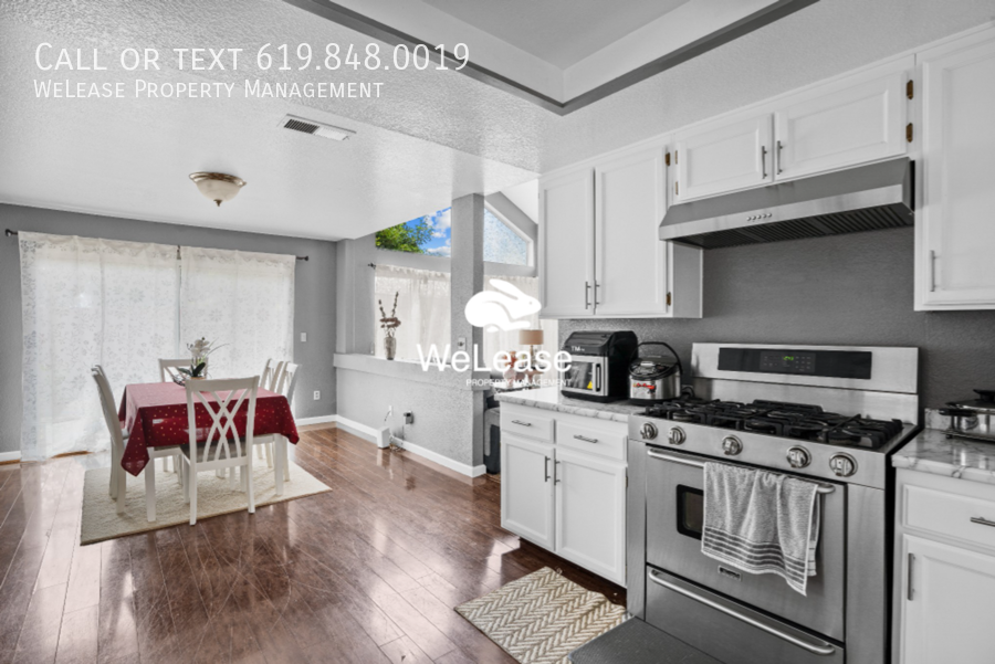 Primary Photo - Charming 3-Bed 2-Bath Home with Sunlit Int...