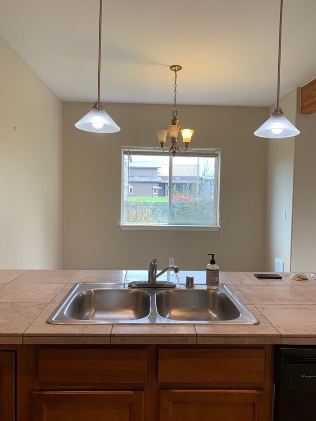 Eating bar and dining room open to living and kitchen. - 103 Thendara Park Dr
