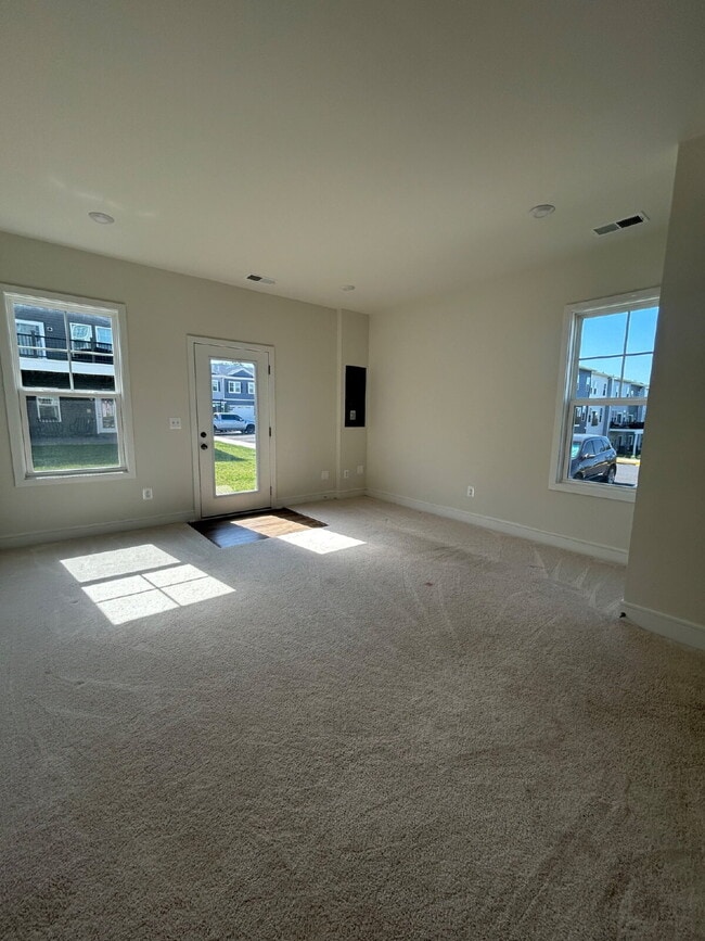 Building Photo - Free Application Fee — Refunded Upon Approval Through August 31! Upgraded 3BR End-Unit Townhome |...