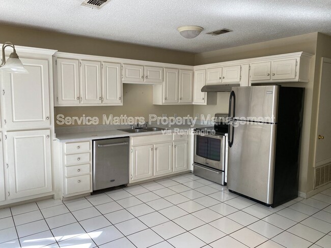 Building Photo - 6969 Weatherwood Dr
