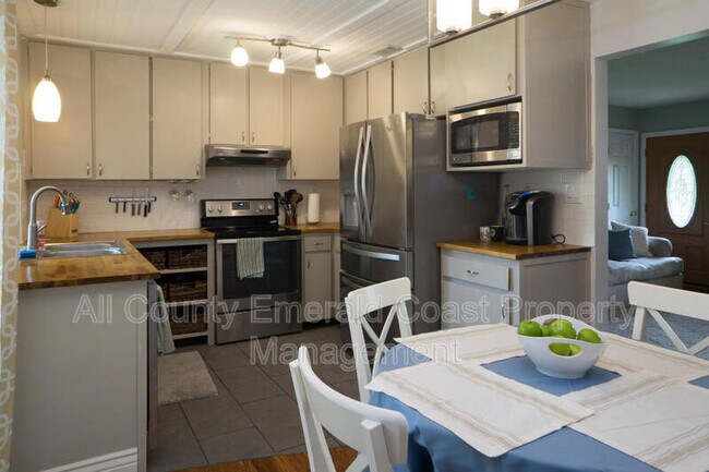 Foto del edificio - 6 Shady Oaks Ln