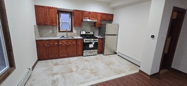 Photo - 400 E 7th St Apartment