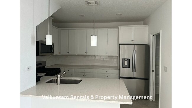 Foto del edificio - 563 Cherry Elm Dr