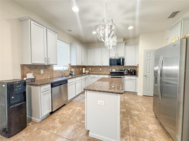 Building Photo - 5594 Angelonia Terrace