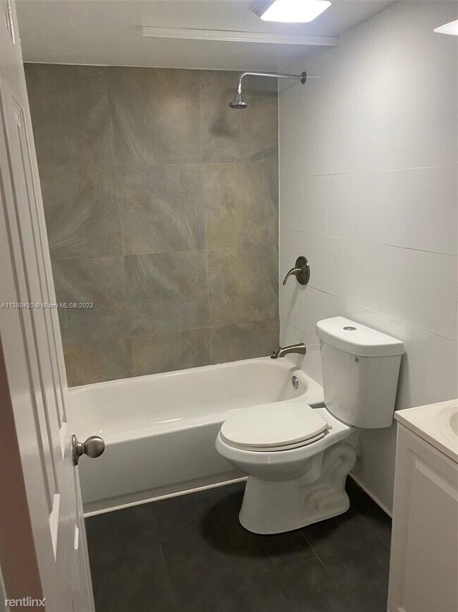Building Photo - 2 br, 2 bath Condo - 8301 SW 142nd Ave Apt...
