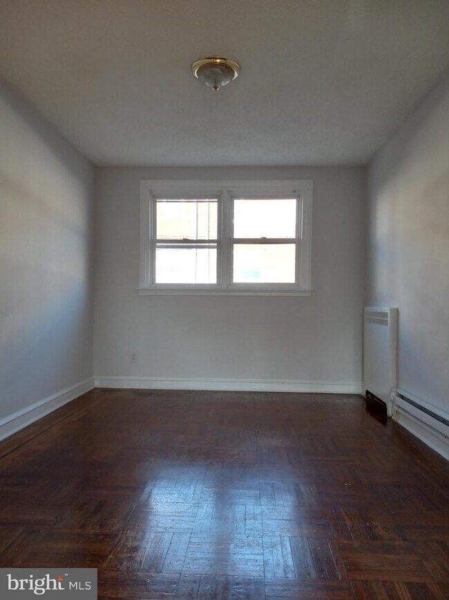 Building Photo - 7519 Woolston Ave