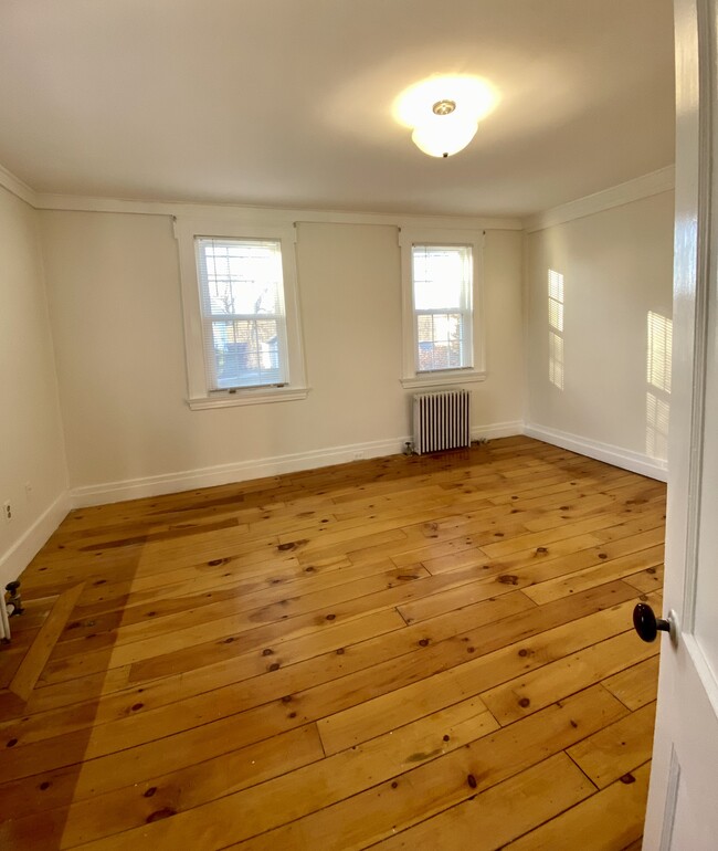 bedroom with walk in closet - 48 S Main St