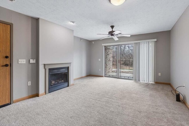 Relax and unwind in this bright, open living space featuring cozy comforts and room to gather with the people who matter most. - Grand Legacy