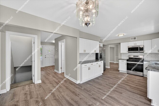 Building Photo - Rare Rental Opportunity in Southfield — Fully Renovated 4-Bedroom Brick Colonial!