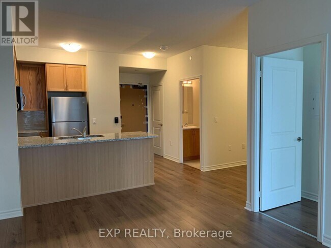 Photo du bâtiment - 349-349 Rathburn Rd W